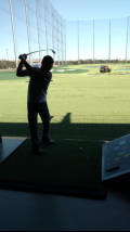 Golfing at Top Golf driving range