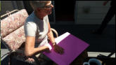 Arlene opens card from Greta and Bob