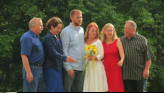 Bride and groom with parents