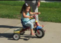 Nora can reach the peddles this year.