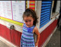 Nora waiting for tickets for the rides