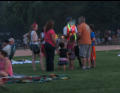Sue and Nora getting a glow stick.
