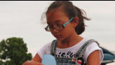 Elaina working on her project