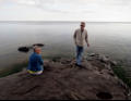 Arlene and Eric looking for round stones.