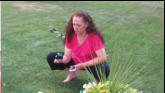 Monica adjusting music on her ipod.