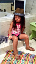 Playing with sea shells. One of her favorite things to do.