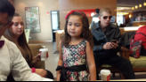 Nora waiting for ride to wedding