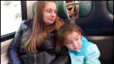 Nicole and Nora on train into New York