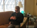 Eric checking his phone.