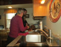 Arlene tries out her new electric knife.