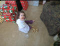Nora Playing With Wine Bottle Corks.