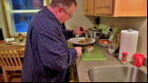 Bob does the traditional carving