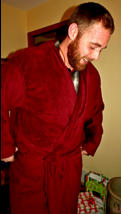Dave tries on his new robe.