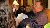 Bob receives Nora's home made gift.