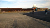 A view of the building from the parking lot