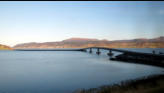 Taking bridge to visit island.